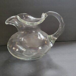 Ruffled Clear Glass Pitcher With Curved Handle & Wide Spout